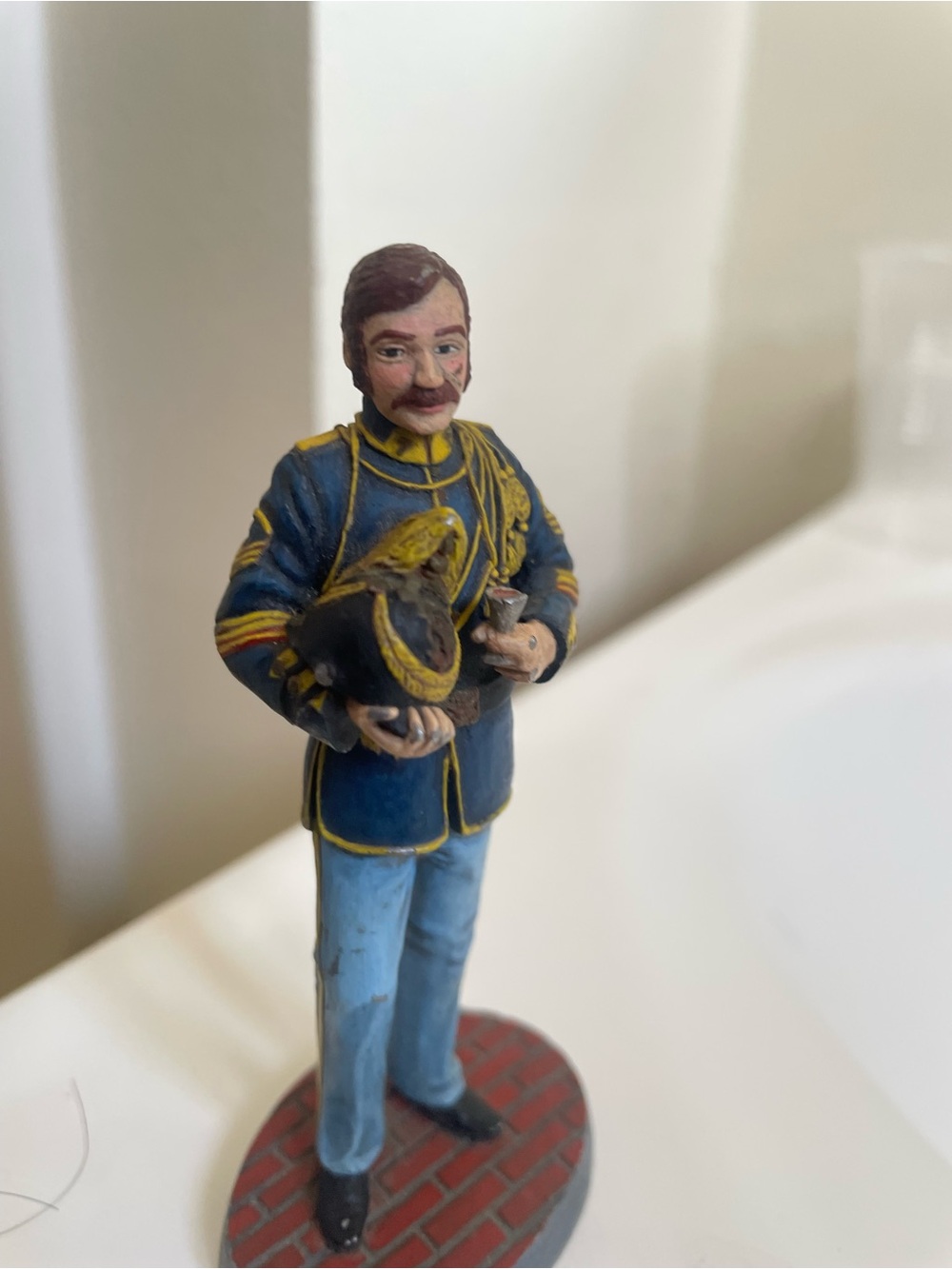 Hand-Painted Blue and Yellow Military Figurine Accent